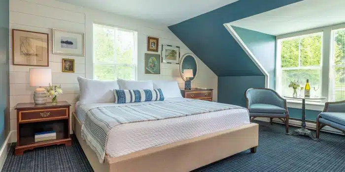 A queen bed in one of the cottages