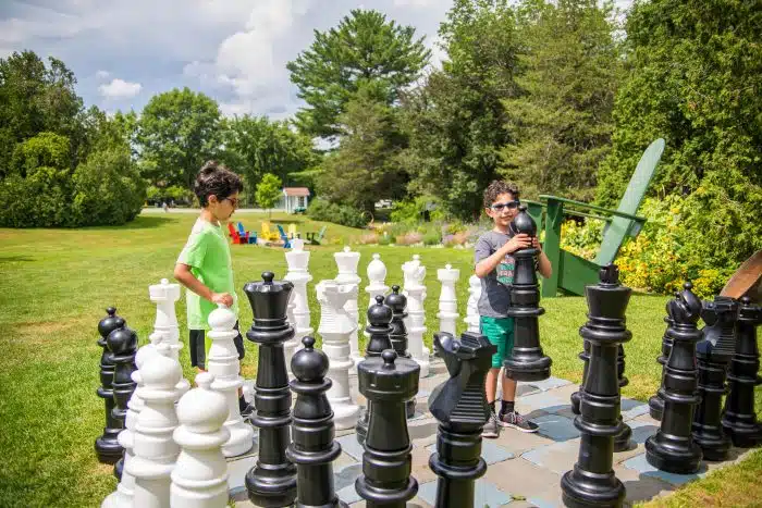Kids playing giant chess