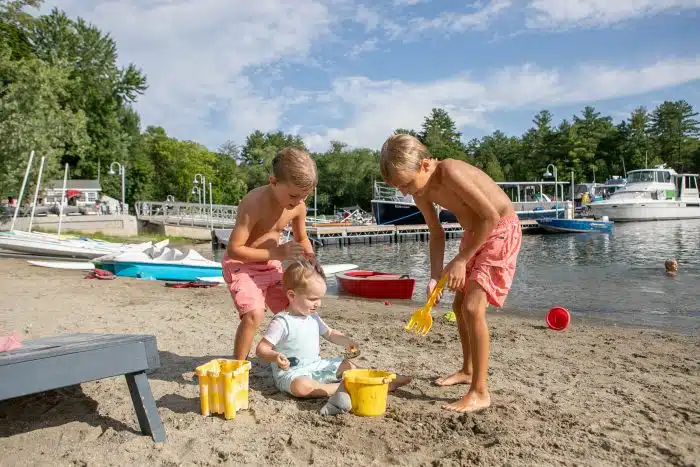 Kids making sand castles on the beach