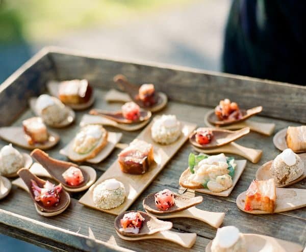 Bite sized appetizers on a stationary display for a group to enjoy.