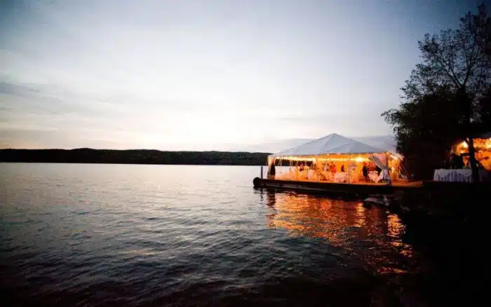 Glowing North Dock tent during a cloudy evening