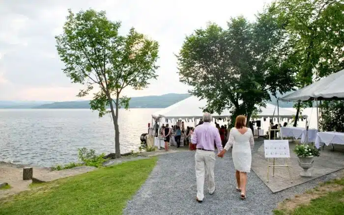 Couple walkinging hand-in-hand to an event at the North Dock