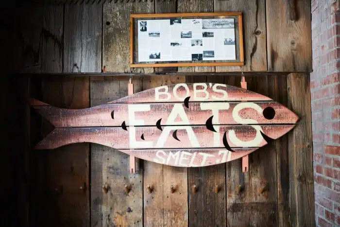 A wooden decoration in the shape of a fish inside the Red Mill