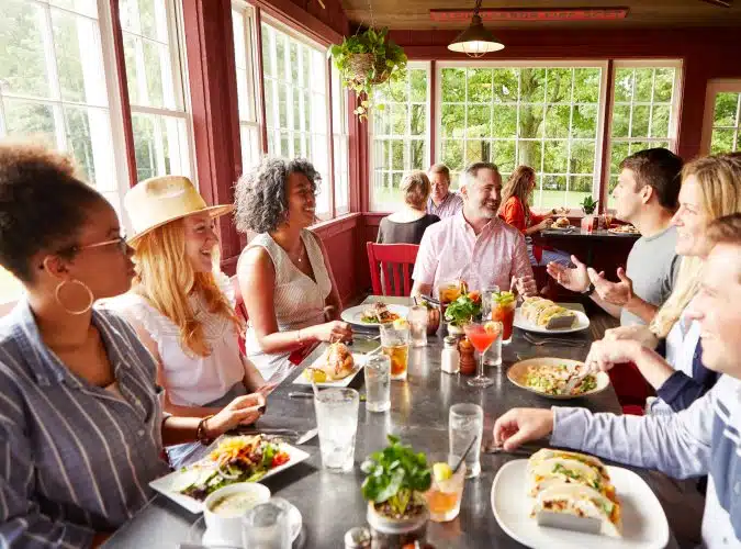 A family having dinner at the Red Mill