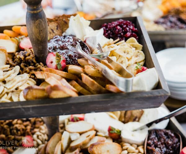 Large wedding food display with dried fruits and nuts