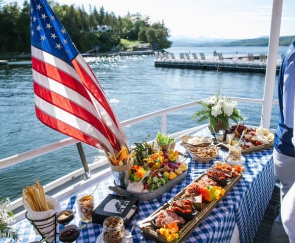 A variety of special event menu items on display boards being enjoyed aboard the cruise boat