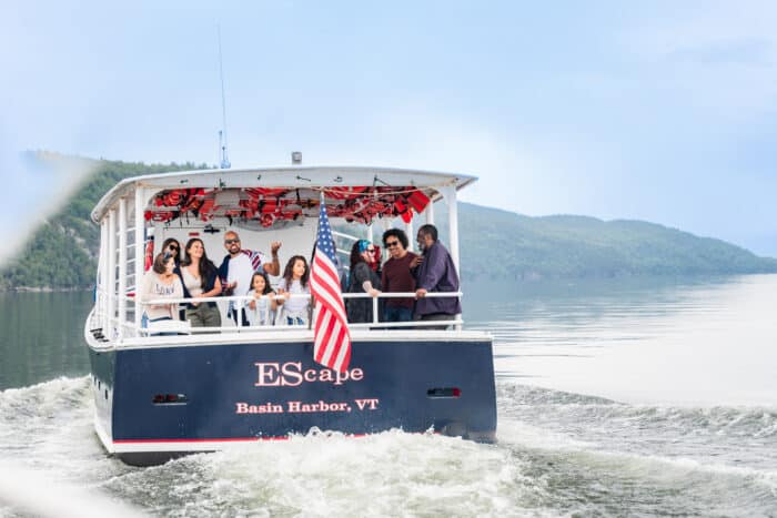 A close up of a group of people riding on the EScape Cruise