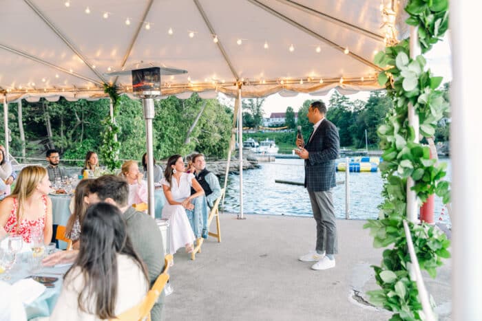 Group listens to a speech on the North Dock Reception / Rehearsal Dinner