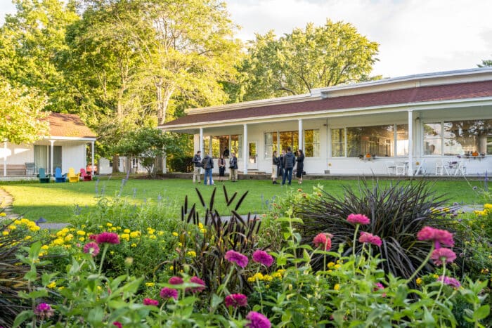 A group of people outside Ardelia's