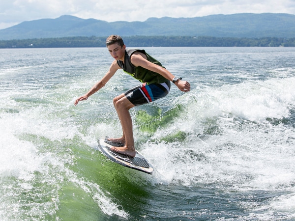 Man wake surfing on Lake Champlain.