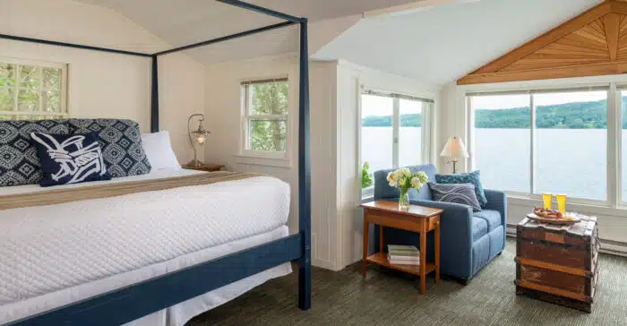 A bedroom with a king bed in one of the accommodations