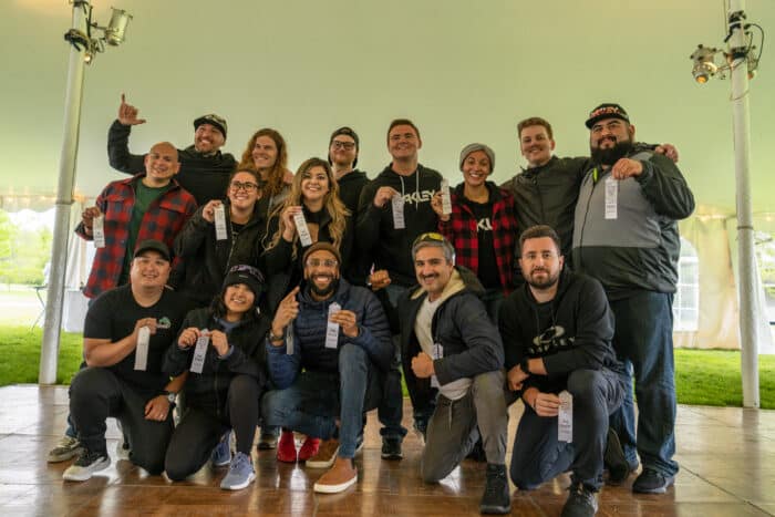 A group poses with their winners ribbons