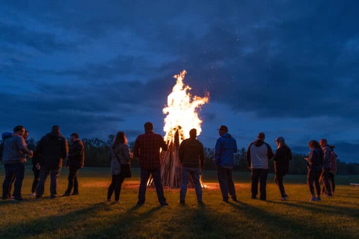 Group enjoys a giant bonfire at the Red Mill