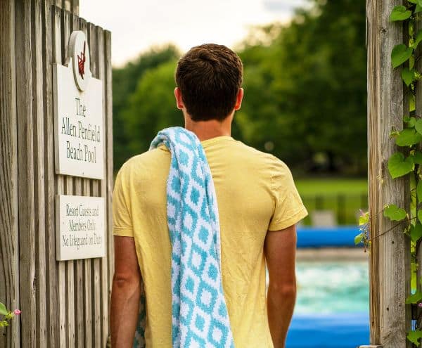 Man entering pool